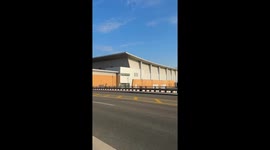 Men play chess with wine on river in Grand Rapids, USA
