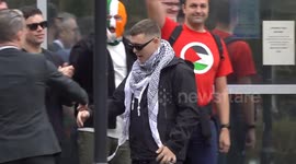 UK: UK court drops terrorism charge against Kneecap rapper over Hezbollah flag