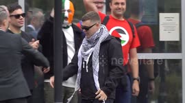 UK court drops terrorism charge against Kneecap rapper over Hezbollah flag