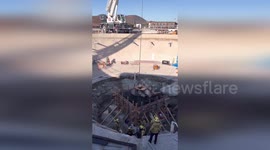 US: Firefighters Rescue Individual From 15-Foot Fall Inside Concrete Holding Tank