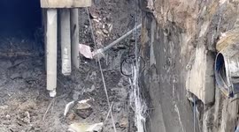 Bangkok governor checks repairs to sinkhole that opened up Bangkok road