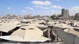 Displaced Palestinians in Gaza struggle with overcrowding, severe food shortages
