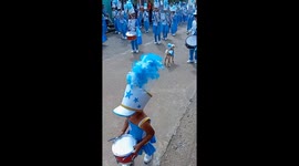 Cute dog in costume leads marching band parade in San Luis, Honduras