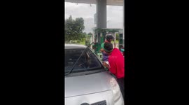 Dog barks nonstop during gas station car cleaning in Lam Plai Mat, Thailand