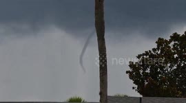 Twisting Tornado Forms And Quickly Disappears Over Florida