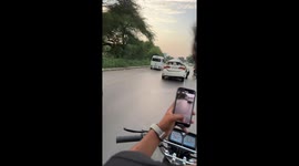 Heavily damaged car still in operation in Jhelum, Pakistan