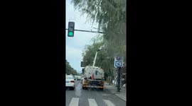 Unique street scene with giraffe statue in Jilin, China