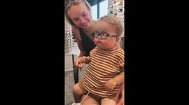 Little boy amazed by new glasses in St. Thomas, Canada