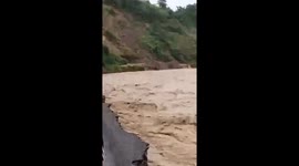 Typhoon Bualoi floods drag pickup truck downstream in Laos