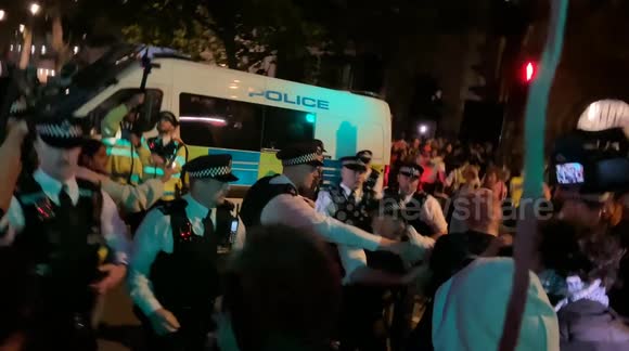 Police clash with protesters in London during a demonstration in solidarity with the Gaza flotilla