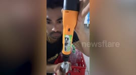 Thai man makes a DIY bottle capping machine