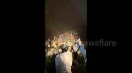 Chaos on Chinese mountain as holiday storm forces thousands of tourists to shelter in toilets