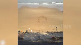 Giant sand picture of Keir Starmer as Big Brother from 1984 appears on beach