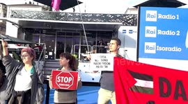Italy: Extinction Rebellion Storms Turin Motor Show In Protest Against War Profiteers