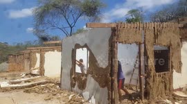 Construction Workers Dodge Falling Wall