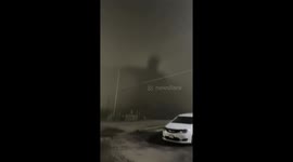 Giant shadow illusion in thick fog in Uniontown, Pennsylvania, USA