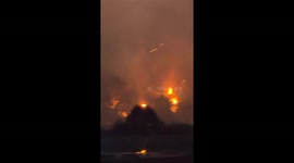 Drone sparks ignite hillside fire during Liuyang light show in Hunan, China