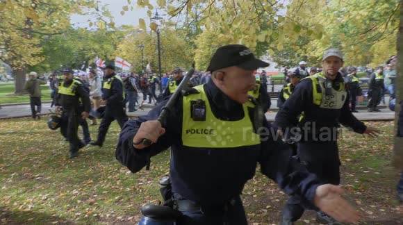 Batons out! Clashes in Bristol as anti-immigration protesters face off with counter-demonstrators
