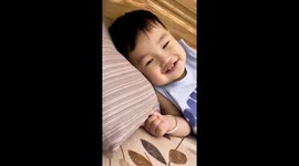 Caught on Camera: Baby's Adorable Mysterious Smile Will Melt Your Heart!