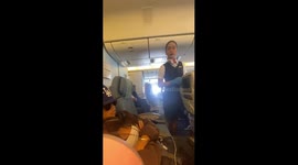 Holidaymaker slaps sleeping friend on plane to answer air hostess' question