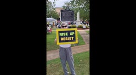 Demonstrators rally at R for Resistance protest in Jacksonville, Alabama, USA