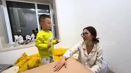 Little boy cries after losing slap hand game in Jilin, China