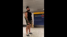 6’10” actor and bodybuilder Lukas Lakutsin walks through New York subway, nearly touching the ceiling with his head.
