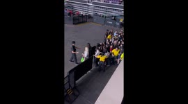 Crazed K-Pop fans push past guards to secure places before concert