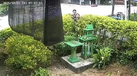 Students crash motorbike into roadside shrine