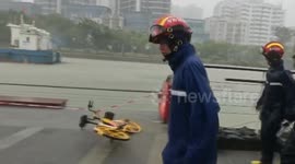 China: Rescuers prevent cargo ships from colliding with bridge amid typhoon