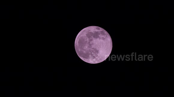 Harvest Moon over Chiang Mai: The night of the end of Buddhist Lent, a time of religious observance.