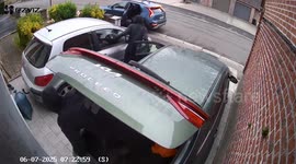Shocking moment man scares off masked men attempting to steal car in broad daylight