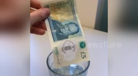 Newsflare Edit - Water dunk test on new #fivepoundnote-now I can swim with my money-perfect4 when real British weather resumes!#fiver
