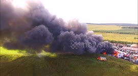 Dramatic aerial footage of a massive fire at a car lot in Northern Ireland