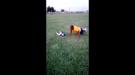 Funny baby trying to make push-up