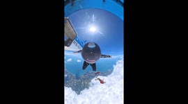 Experience this exhilarating view of a skydive in Thailand