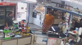 Cop fired after CCTV caught shop worker threats - 