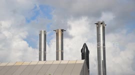 x 2 Booster 15.2 is transported from SpaceX Starbase production facilities to the launch pad.