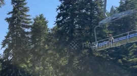 Dog spotted riding solo on ski chairlift