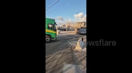 Israeli forces withdrawing from Gaza earlier today after Israeli cabinet approved the deal