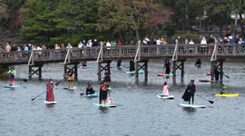 US: Witches, warlocks take to New Jersey lake for annual charity paddle