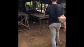 Children playfully covered in charcoal during family weekend in Frederico Westphalen, Brazil