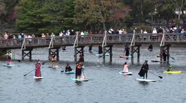 Witches, warlocks take to New Jersey lake for annual charity paddle