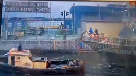 Ship crashes into flood barrier in the Philippines
