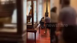 Spain: Activists Hurl Red Paint at Christopher Columbus Painting in Madrid Museum