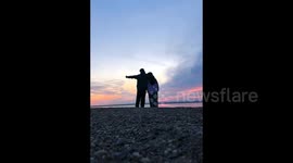 Couple's picturesque video interrupted as FOX snatches phone and runs off