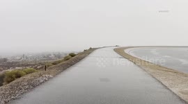 US, Los Angeles: Antelope Valley Rain Floods Roadway