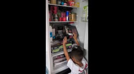 Mom Walks in on Son’s Fridge Struggle