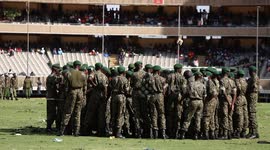 Police fire tear gas as thousands in Kenya mourn opposition leader Odinga in Nairobi stadium (2)