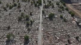Syria: Relatives search for signs of loved ones in Syrian cemetery left in ruins by Assad regime